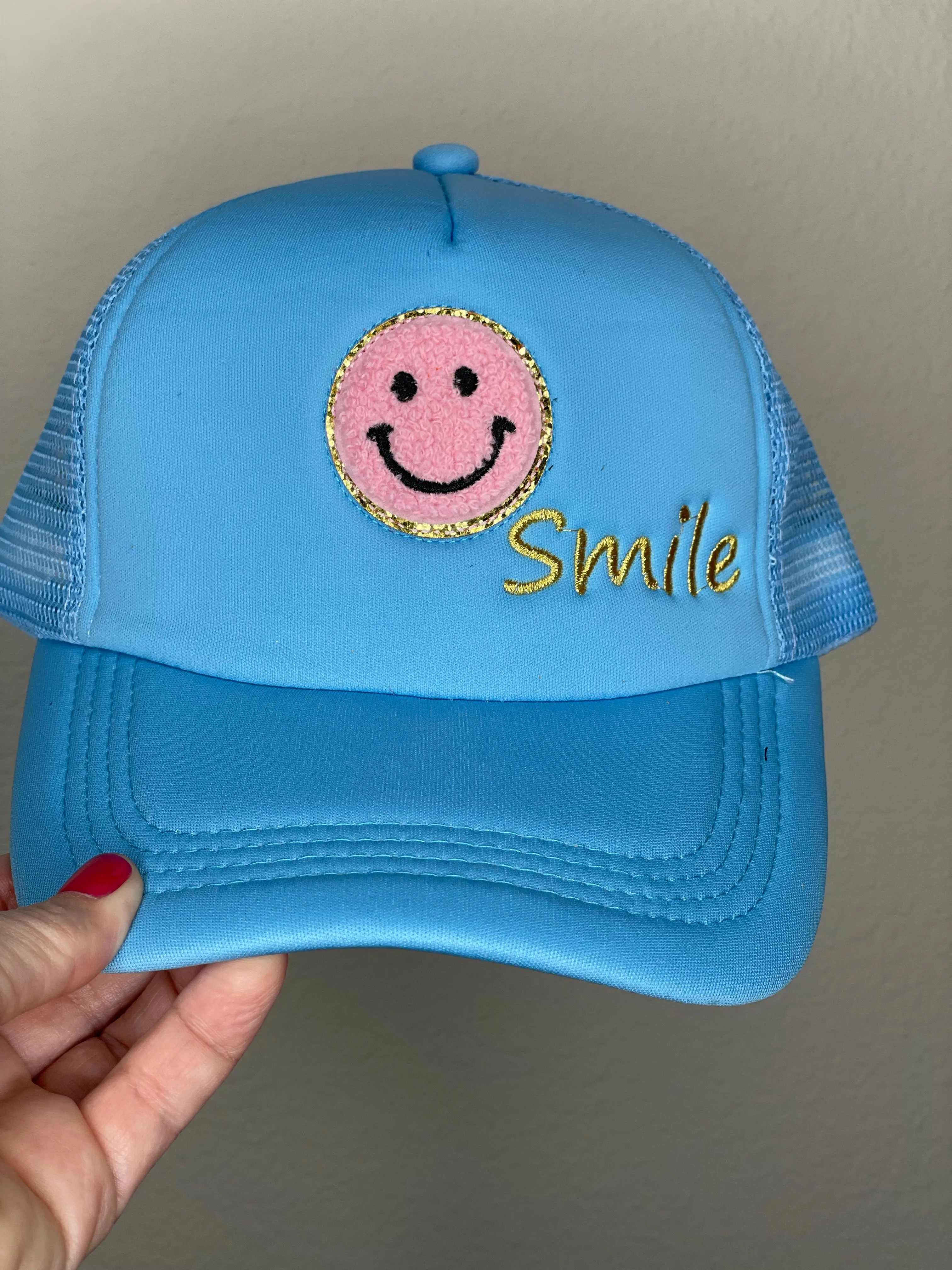 Caryn Lawn Smile Trucker Hat